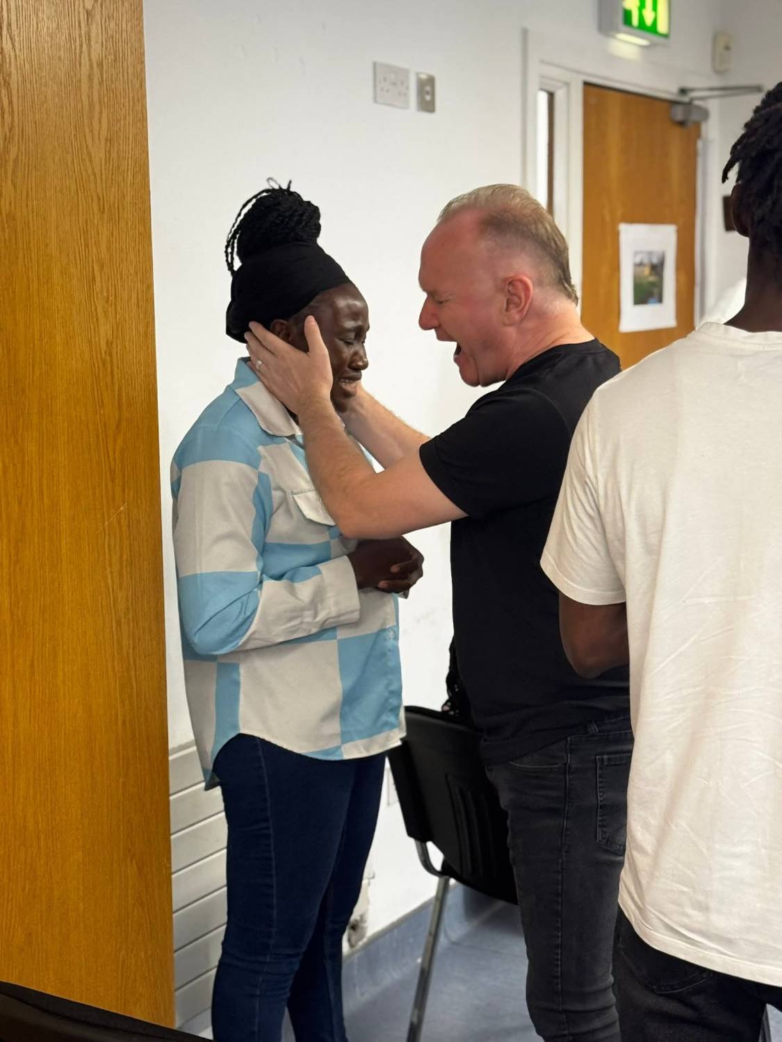 A moment of prayer and ministry at EBM