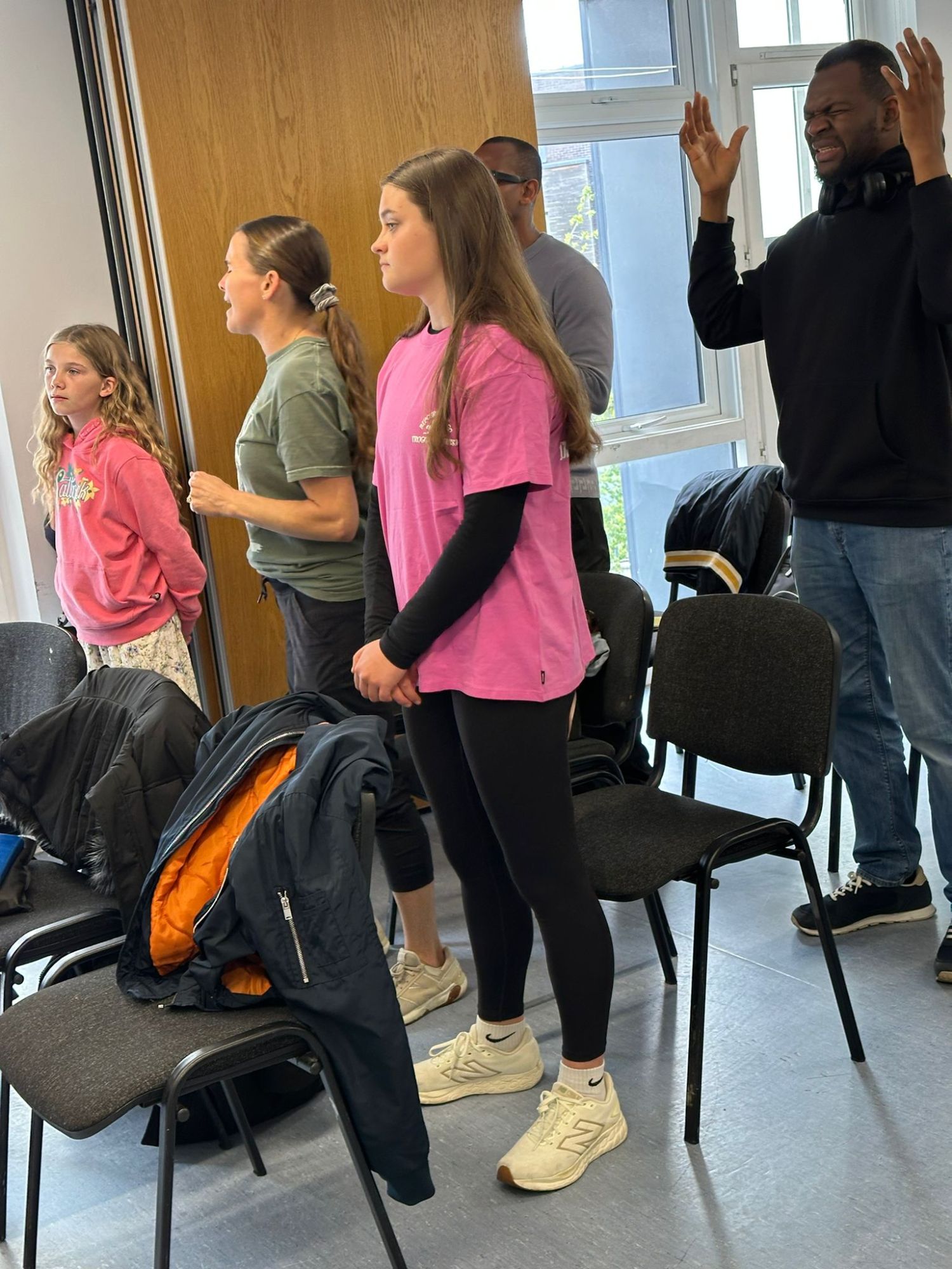 Families worshipping together at EBM